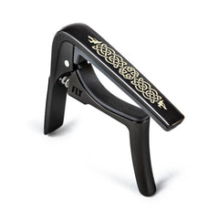 Dunlop 63CBKC Trigger Fly Capo Celtic Knot Edition Curved - BLACK